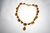 Orange Topaz Halo Riviere Necklace - large and medium ovals